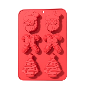 Red 6-cavity silicone Christmas mold featuring Santa, candy cane, and tree shapes