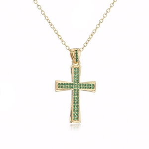 Detailed view of an 18K gold plated cross pendant necklace featuring green zircon stones