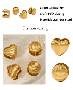 Macro shot of PVD plated stainless steel heart and round earrings with vertical texture