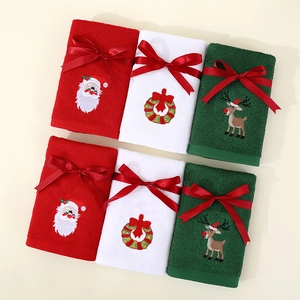 Christmas embroidered cotton towel set featuring Santa and Reindeer with festive red bows