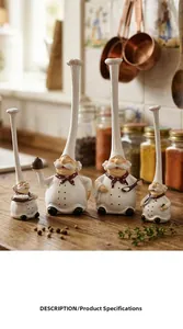 Detailed view of four resin chef figurines with tall hats and burgundy neckerchiefs