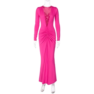 Detailed view of deep V-neckline and waist pleats on rose red slim fit long dress