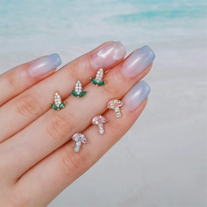 Exquisite flower and mushroom ear studs with green zircons and gold-plated copper finish