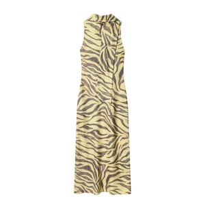 Elegant sleeveless zebra print halter neck maxi dress in soft yellow and brown tones