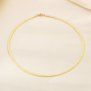 Flat gold snake chain necklace made of stainless steel with a secure lobster clasp closure