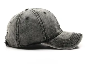 Side view of grey washed denim baseball cap with vintage acid wash and metal buckle