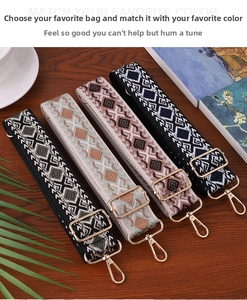 Detail of four ethnic pattern woven bag straps with gold metal hardware on wood background