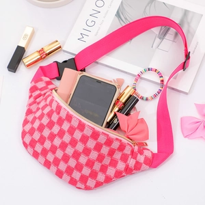 Pink checkered woven fanny pack for sports featuring adjustable strap and spacious interior