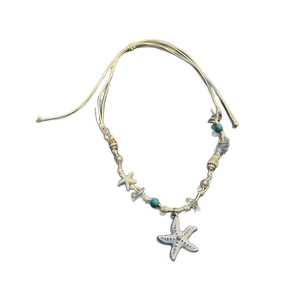 Summer ocean style necklace with ceramic conch shells and beads on adjustable cord