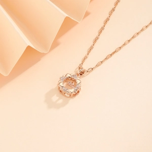 Collana in acciaio inossidabile oro rosa con ciondolo a cuore danzante in zircone