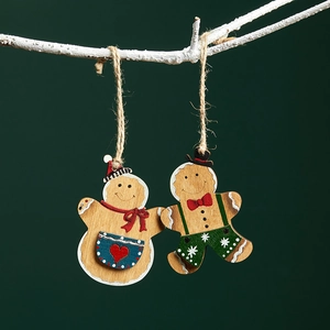 Set of two handcrafted 8cm painted wooden gingerbread man ornaments with rustic hemp rope