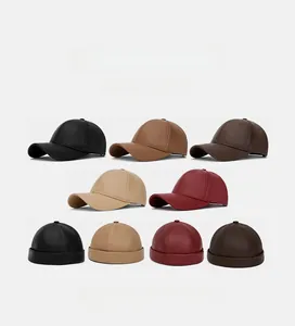 Detailed matrix display of multi-color PU leather baseball caps and dockers hats