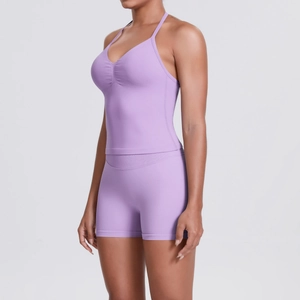 Detail of lavender seamless yoga set showing V-neck crop top and high-waist sports shorts