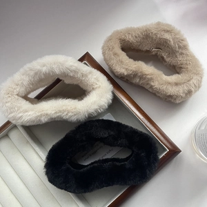 Three-piece plush faux fur hair scrunchies in white, beige, and black colors for winter