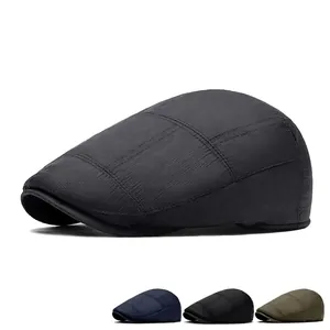 Men's winter flat cap with vintage plaid pattern texture in deep grey and multi-colors