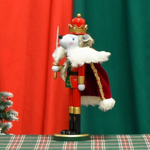 Christmas mouse king nutcracker ornament with red cape and sword on festive background