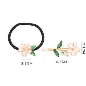 Detailed size view of pink flower hair tie and gold clip set with 2.8cm blossom