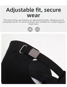 Adjustable metal buckle on the back of a black cotton baseball cap for a custom fit