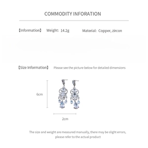 Detailed size chart for silver heart zircon tassel earrings showing 6cm length and 2cm width