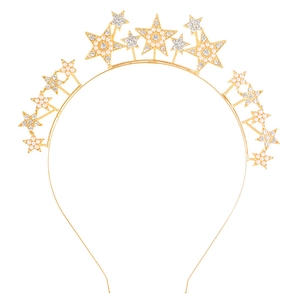 Macro shot of gold star headband featuring sparkling rhinestones and elegant pearls