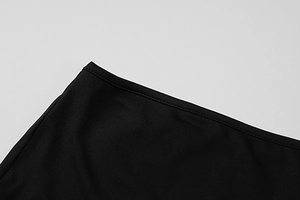 Close-up detail showing the high-quality stitching and dense knitted fabric of the dress
