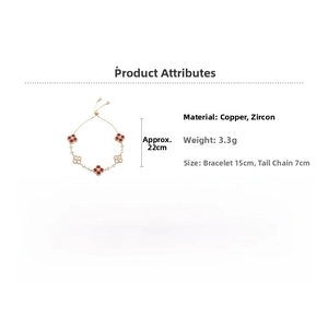 Detailed view of 18k gold plated bracelet showing red and white zircon clover charms