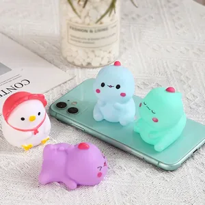 Cute mini squeaky dinosaur vinyl toys in various colors for creative kids' sensory play