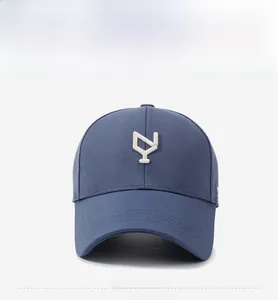 Front view of a dark blue baseball cap featuring detailed white 3D logo embroidery