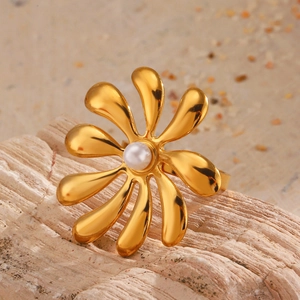 Minimalist 18K gold plated flower ring with white pearl inlay on a natural textured base