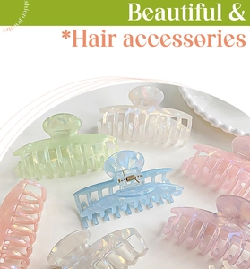 Macro detail of large colorful iridescent hair claws in various shimmering pastel colors