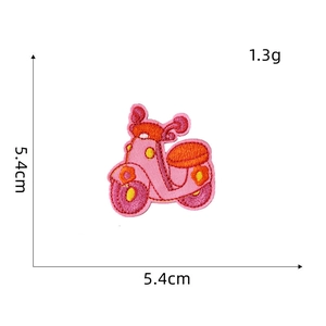 Detail of pink cartoon scooter embroidered patch with precise 5.4cm size dimensions