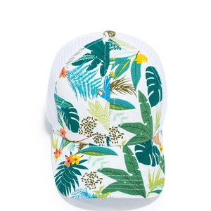 Breathable mesh baseball cap featuring vibrant tropical green leaf and floral prints