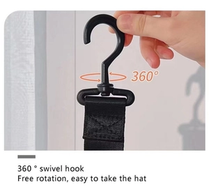 Detail showing a black 360-degree swivel hook with durable nylon webbing for hat storage