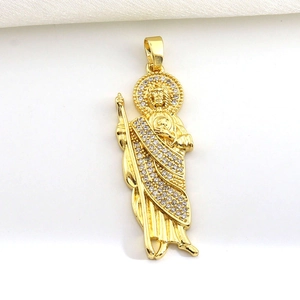 Detailed close-up of a gold-plated St. Jude religious pendant with micro-set zircon crystals