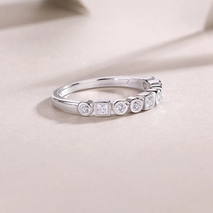 Detailed close-up of a silver moissanite band showing the US size 7 engraving inside