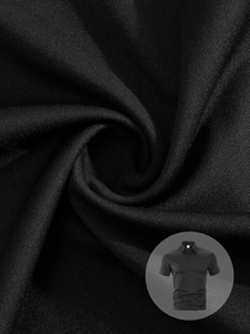 Macro texture of breathable knit cotton on black polo shirt showing fabric detail
