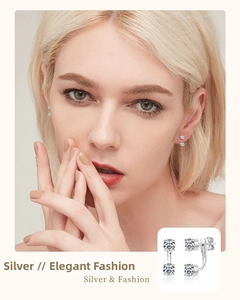 Detailed view of S925 silver ear jackets with round moissanite in fan-shaped design