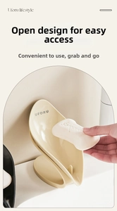 Leaf-shaped soap dish with a self-draining sloped design for bathroom countertops
