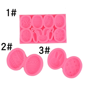 Detail view of pink silicone Easter egg and bunny fondant molds for DIY baking and decoration