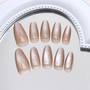 Cat eye almond press-on nails in translucent nude pink with 10 pieces set