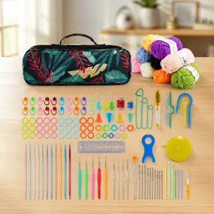 Complete crochet kit with yarn, bamboo hooks, and floral storage case on white background