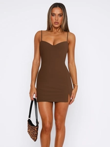 Detail of slim fit brown mini dress featuring a delicate side slit and spaghetti straps