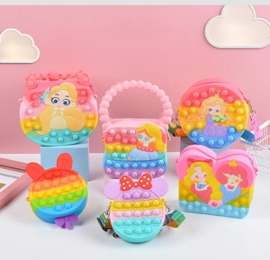 Collection of colorful rainbow silicone pop-it bags for kids in diverse playful shapes