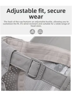 Detail of adjustable press buckle and breathable mesh fabric on grey outdoor sports cap