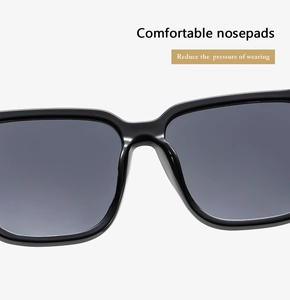 Detail showing comfortable ergonomic nose pads on oversized black sunglasses frame