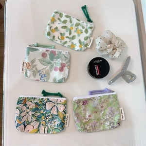 Floral cotton mini zipper pouches in green and lavender for coins and cosmetics