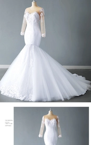 Detail of white fishtail wedding dress with lace embroidery, sequins and long train