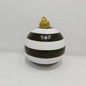 Close-up of a 60cm giant inflatable Christmas ball with black and white stripes and gold top