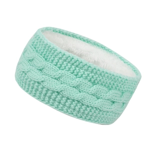 Detail of mint green cable knit headband with thick white fleece lining for warmth