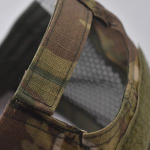 Macro view of Multicam tactical mask featuring metal mesh and adjustable velcro strap